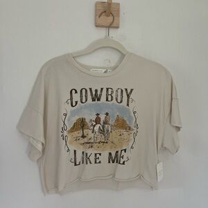 Cropped “Cowboy Like Me” Taylor Swift tee from Altar’d State